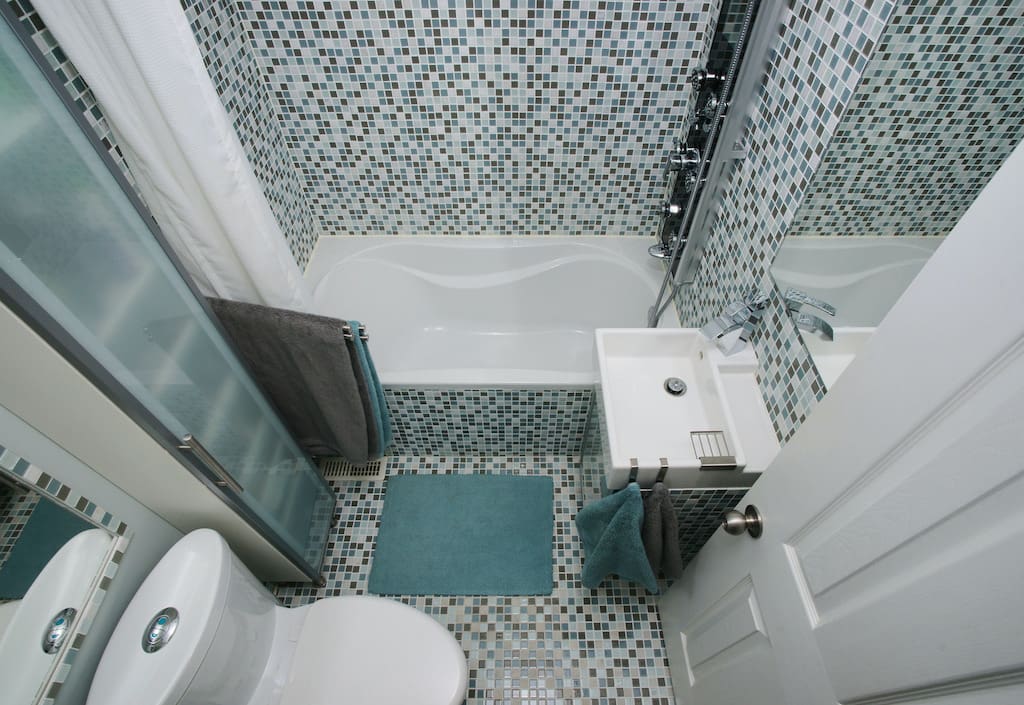 Maximize your small bathroom remodel with a tile-like pattern