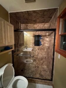 A modern, accessible walk-in shower installed in a home in Western Massachusetts.